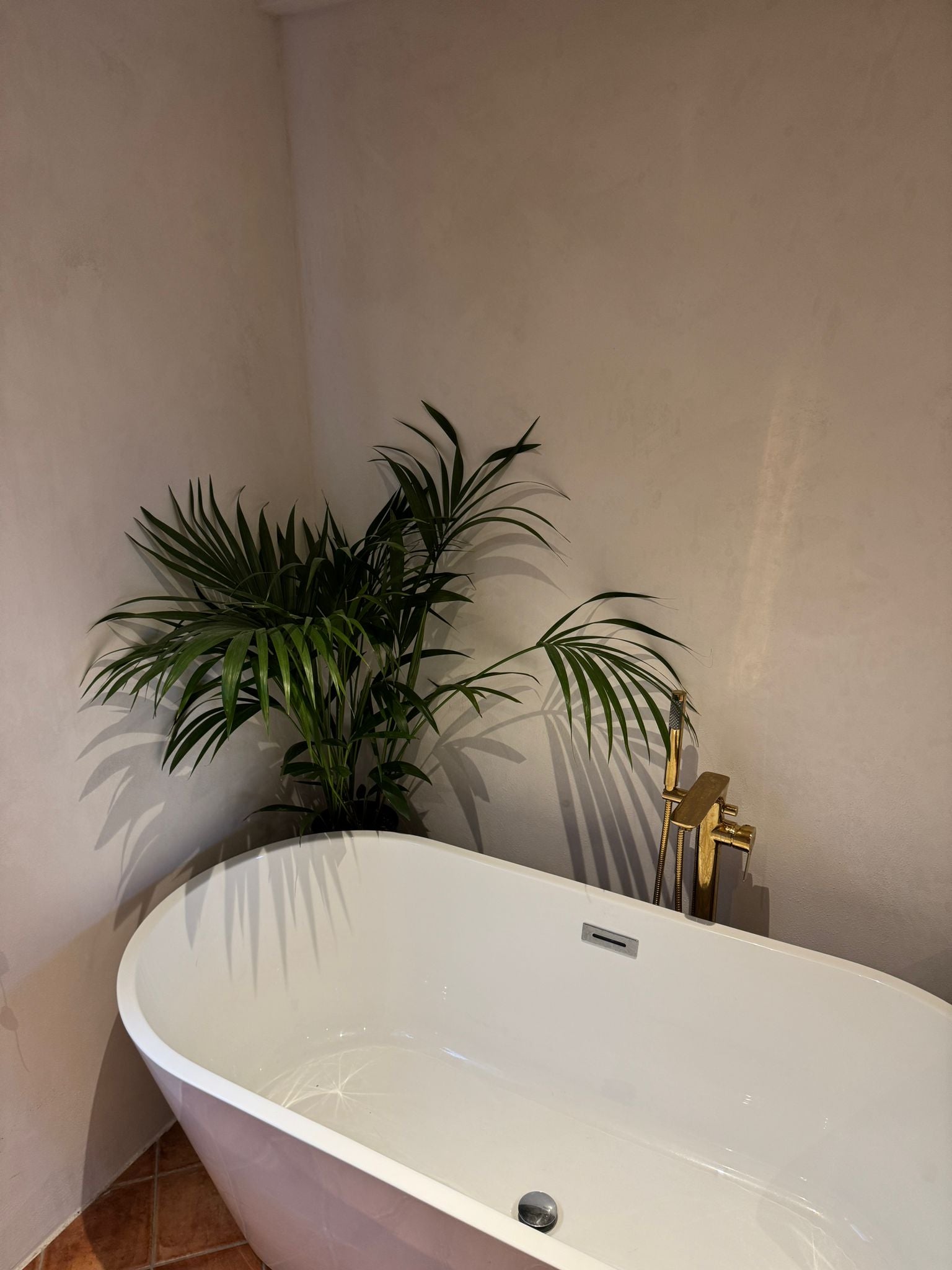 Bathroom walls painted with KULTA Limewash Paint, showing its eco-friendly, natural matte finish.